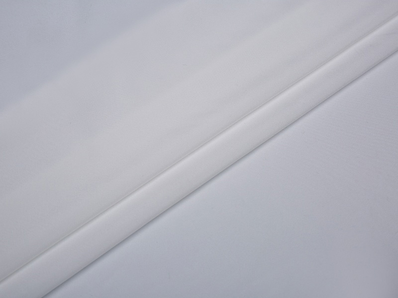 Poliészter nyújtó bélés