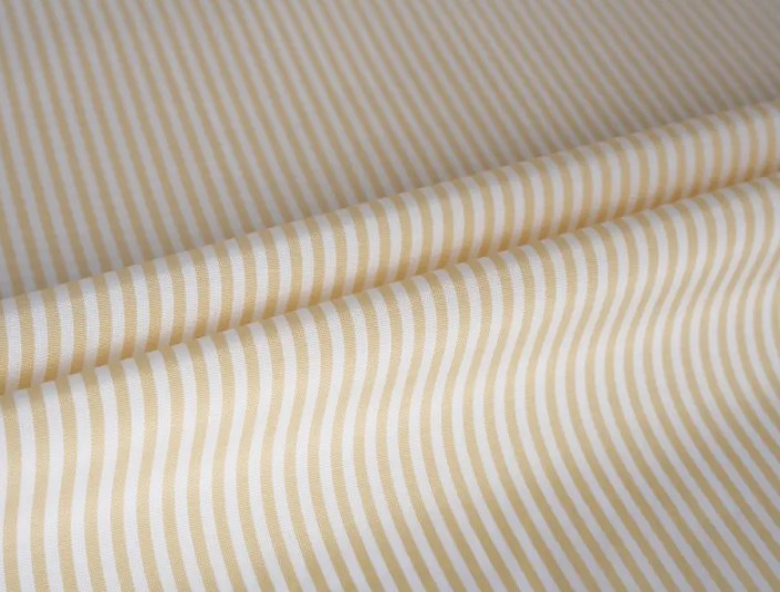 A tartós és gyönyörű fonalral festett hüvelyes béléses anyag felhordása a csúcskategóriás ruha kialakításában